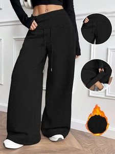 Women's black thermal wide leg trousers with adjustable drawstring elastic waist