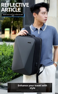 Waterproof geometric hardshell business backpack with external USB charging port