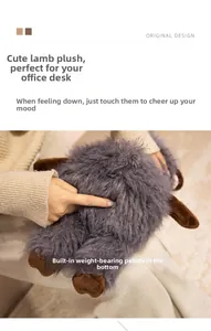 Close-up of soft plush lamb toy showing purple faux fur and weighted grain base