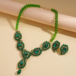 Vintage emerald style beaded necklace and earring set with teardrop acrylic glass pendants