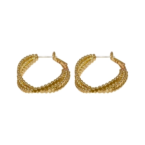 Minimalist metallic twisted triple-layer gold hoop earrings with textured beaded finish
