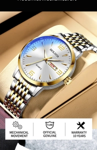 Detail view of MOLDOA two-tone watch dial with day-date display on leather pillow