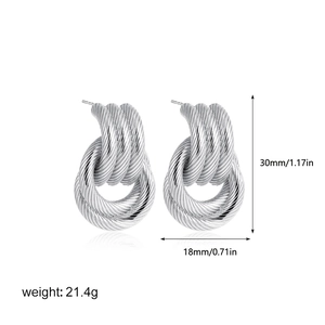Detailed view of silver twisted textured layered earrings with size and weight specs