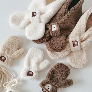 Detailed embroidery of cartoon bear on plush fleece scarf and mitten set for kids