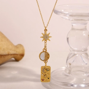 18K gold plated stainless steel necklace with star, moon, and shell tassel pendants
