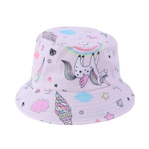 Detailed view of pink toddler sun hat with unicorn and rainbow cartoon prints