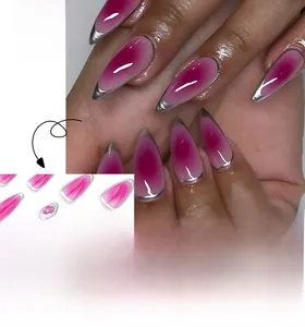 Detailed view of almond-shaped press-on nails with rose red gradient and silver French tips