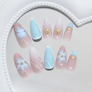 Blue ocean theme press-on nails with 3D starfish and flower designs in almond shape