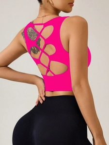 Débardeur de yoga rose avec découpe en forme de cœur et dos nu pour le fitness
