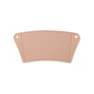 Detailed view of pink PU leather coffee sleeve with stitching and gold metal eyelets