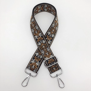 Ethnic embroidered wide bag strap with silver metal swivel hooks and adjustable buckle