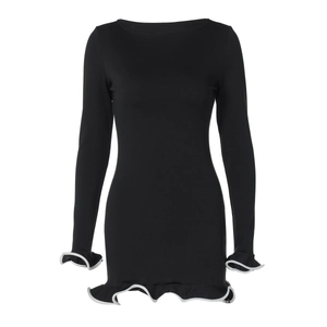 Close-up of black bodycon dress featuring white contrast lettuce trim on cuffs and hemline