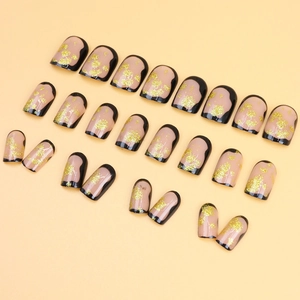 Elegant gold foil press-on nails with black French tips and shimmer finish, 24 pieces set