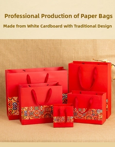 Detail of red Chinese style gift bags in five sizes made from premium white cardboard