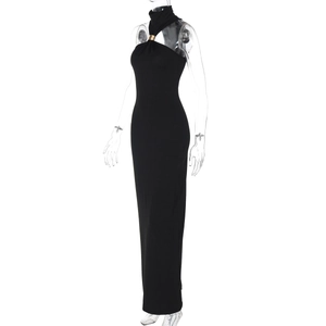 Detail of elegant black high-neck maxi dress with a decorative gold metal buckle at collar