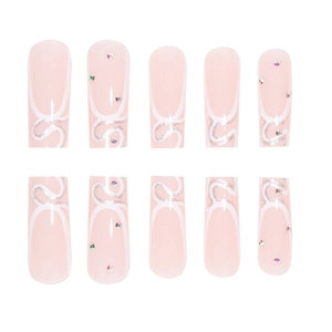 Long coffin french nails with silver glitter and rhinestones on pale pink base