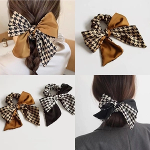 Elegant bow scrunchies with houndstooth and satin fabric in brown and black