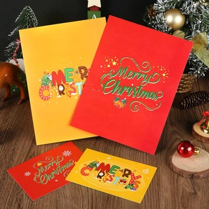 Detail of red and yellow 3D Christmas cards with festive Merry Christmas designs