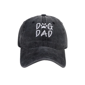 Vintage washed cotton baseball cap featuring Dog Dad embroidery and paw print design