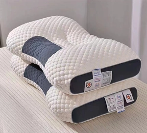 Detail of stacked ergonomic pillows with 8H brand labels and grey honeycomb mesh texture