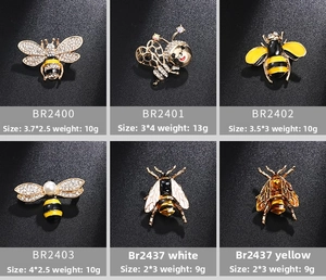 Detailed grid of six assorted bee brooches with rhinestones and pearls on a grey background