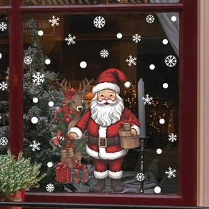 Christmas window stickers featuring Santa Claus, reindeer, and snowflakes on a glass window