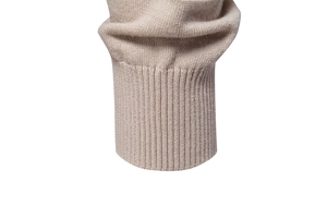Close-up of ribbed cuffs on a beige knit sweater showcasing premium fabric texture