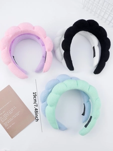 Flat lay of colorful padded puffy headbands in velvet texture with 19cm size detail