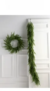 Detailed close-up of high-density PE pine garland with realistic soft rubber texture