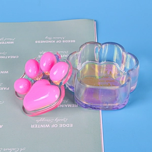 Detailed view of 3D cat paw storage box with pink lid and iridescent holographic base