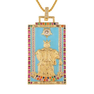 Macro detail of Justice tarot card pendant with blue enamel and colorful zircons