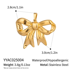 Detailed view of gold stainless steel bow pendant with dimensions 3.0cm width and 3.8g weight