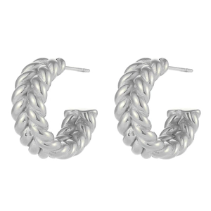Close-up of S925 silver C-shaped hoop earrings with twisted rope texture and polished finish