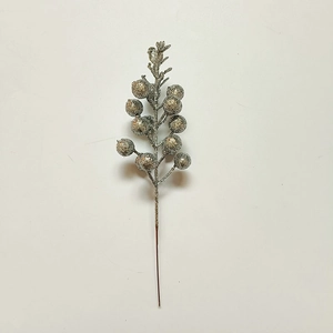 Detail of a sparkling silver artificial berry stem for Christmas tree decoration and DIY crafts