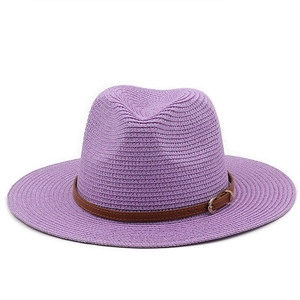 Lavender woven straw sun hat with brown leather band and gold buckle for beach outings
