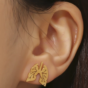 Gold lung-shaped stainless steel stud earring shown as a close-up on a person's ear
