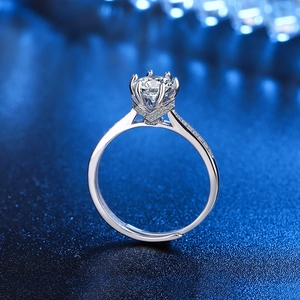 Elegant V-shaped silver open ring with six-prong crown setting and sparkling zircon stone
