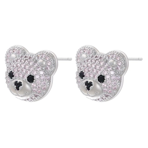 Detail of bear stud earrings featuring pink and black pave crystals on silver metal
