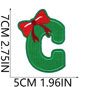 Christmas embroidered letter C patch with green pattern and red bow, sized 7x5cm