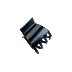Sleek black metal claw clip for high ponytail, minimalist hair accessory on white background