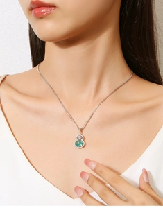 Elegant S925 silver necklace featuring a green gourd-shaped pendant with diamonds