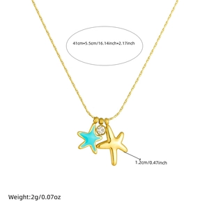 Gold stainless steel necklace featuring a blue enamel starfish pendant with crystal