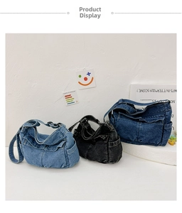 Detailed view of kids denim crossbody bags in light blue, dark blue and charcoal black