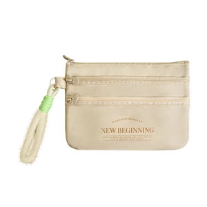 Three-layer beige travel passport holder and organizer with wrist strap and zipper pockets