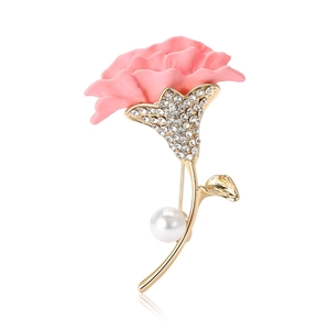 Elegant pink carnation flower brooch with gold plating, rhinestones, and a white pearl accent
