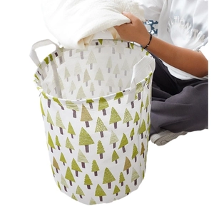 Foldable canvas laundry basket with green tree print for clothes and toy storage