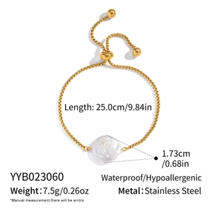 Detail of adjustable gold stainless steel bracelet with a white baroque pearl and size specs