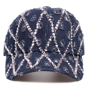 Distressed denim baseball cap with rhinestone lattice pattern and frayed hole detailing