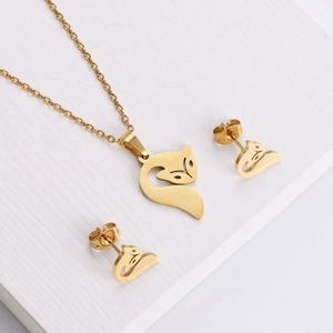 Elegant golden fox jewelry set with animal pendant necklace and matching stud earrings