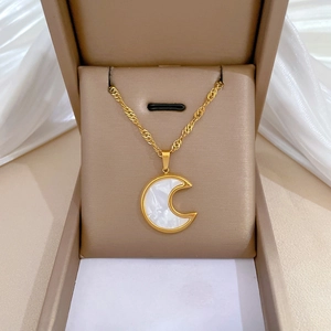 Titanium steel gold crescent moon necklace with shell inlay in a beige jewelry gift box